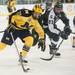 Wolverines left wing Alex Guptill sakes the puck down the ice during the third period of their game against the Spartans at Yost Ice Arena Friday Feb. 1st.
Courtney Sacco I AnnArbor.com   
